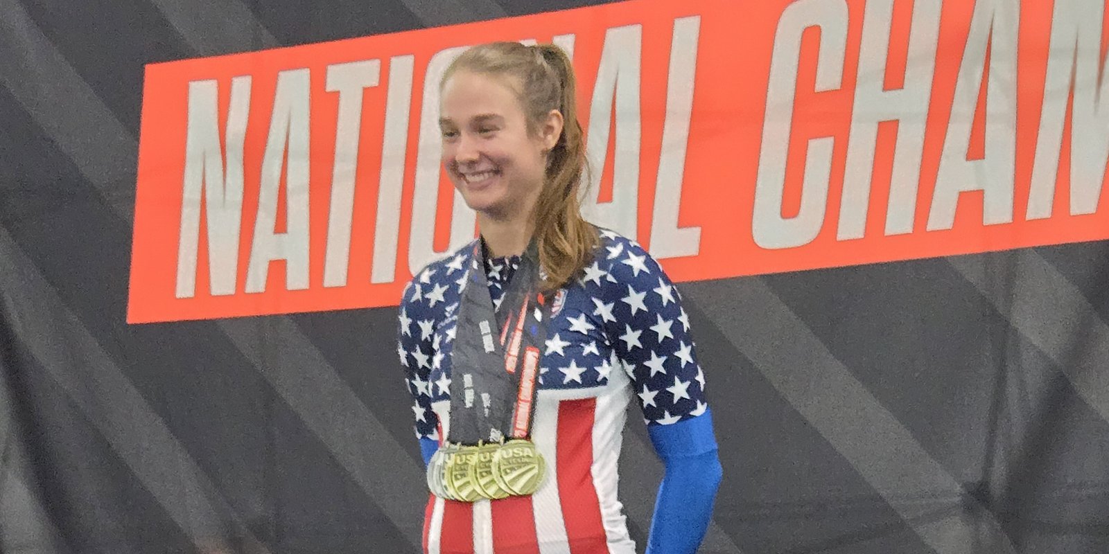McKenna on the podium in her latest Nats jersey at the 2025 track nats in Colorado Springs