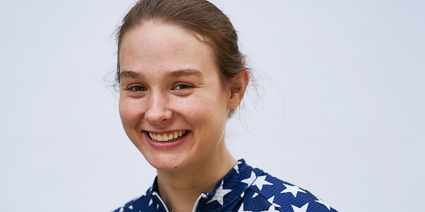 McKenna portrait, 3/4 view, smiling, US colors