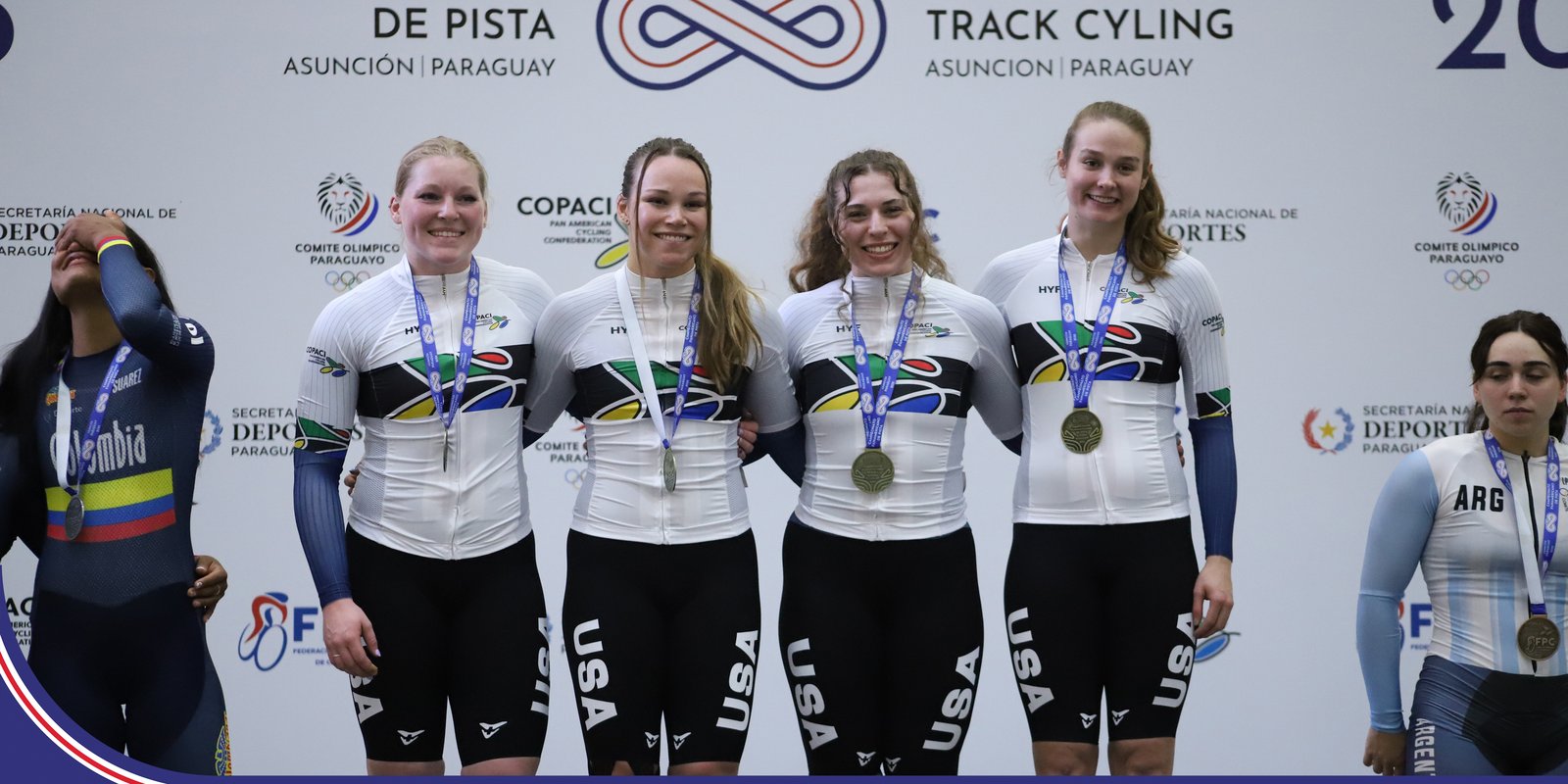 US sprint team at the Panam games, with their gold medals, in champion jerseys